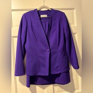 Sz 16 , long sleeve purple suit. Worn once.